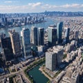 Aerial view of Osaka city from sky building. Bird eye view of cityscape with crowded skyscrapers offices and Royalty Free Stock Photo