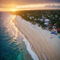 Aerial view of umbrellas, palms on the sandy beach of Indian Ocean at sunset. Summer in Zanzibar, Africa. Tropical Royalty Free Stock Photo