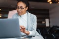 Image of african american businesswoman working on laptop in office Royalty Free Stock Photo