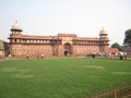 That is the image of Agra Fort where situated a green field