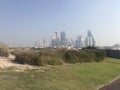 Image of Al Bidda Park with a view of the Doha skyline in the background