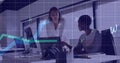 Image of alphabets and statistical data processing over two diverse women discussing at office