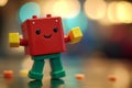 Image of an amusing plastic robot toy dancing happily while celebrating on a wooden surface Royalty Free Stock Photo