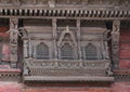 Image of ancient wood carved windows at Lohan Chowk, a royal courtyard located at UNESCO`s World Heritage Site of Kathmandu Durbar