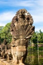 Image in Angkor Wat complex temple. Decorated bridge with warrios guardian and naga serpent. Royalty Free Stock Photo