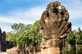 Image in Angkor Wat complex temple. Decorated bridge with warrios guardian and naga serpent. Royalty Free Stock Photo