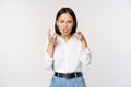 Image of angry pissed off woman shaking from anger, clench hands and grimacing furious, annoyed and outrated, standing