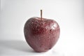 Image of an apple with some water dew drops. Royalty Free Stock Photo
