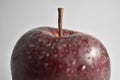 Image of an apple with some water dew drops. Royalty Free Stock Photo