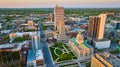 Architecture courthouse green lawn Fort Wayne IN aerial sunrise pink glow skyscrapers