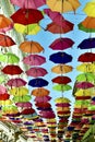 Image of artistic installation of colored umbrellas