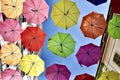 Image of artistic installation of colored umbrellas