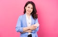 Image of asian businesswoman on pink bakcground