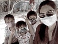 the image of asians their families, wearing masks, prevents severe contagious diseases
