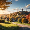 Autumn landscape of hilly countryside in Zuid-Limburg, Small houses on hillside with sunlight in the