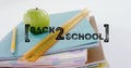 Image of back to school text over apple and school items Royalty Free Stock Photo