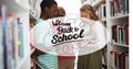 Image of back to school text over schoolchildren in library Royalty Free Stock Photo