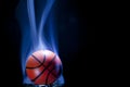 Image of basketball smoke dark background