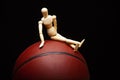 Image of basketball wooden figure dark background