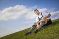 Bavarian tradition man in the grass Royalty Free Stock Photo