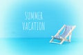 image of beach chair over blue background. Royalty Free Stock Photo