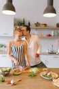 Image of beautiful couple in love preparing breakfast Royalty Free Stock Photo