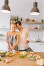 Image of beautiful couple in love preparing breakfast Royalty Free Stock Photo