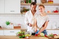 Image of beautiful couple in love preparing breakfast Royalty Free Stock Photo