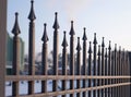 Image of a Beautiful decorative cast iron wrought fence with artistic forging. Metal guardrail close up