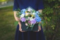 Image of beautiful flowers arrangement with blue hydrangea, white eustoma, spray roses, carnations Royalty Free Stock Photo