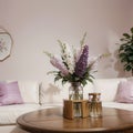 Beautiful lilac flowers on table in living room