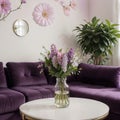 Beautiful lilac flowers on table in living room