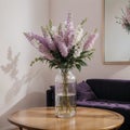 Beautiful lilac flowers on table in living room
