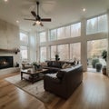 Beautiful living room with hardwood floors fireplace and couch in new luxury home Royalty Free Stock Photo