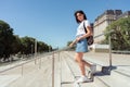 Image of a beautiful smiling young Latin woman walking down a ladder. Copyspace Royalty Free Stock Photo