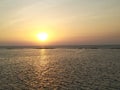 Sunset from the sea side of Mumbai`s slum Geeta nagar Royalty Free Stock Photo