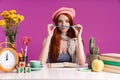 Image of beautiful teenage girl studying with exercise books while sitting at desk Royalty Free Stock Photo