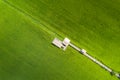 Image of beautiful Terraced rice field in water season and Irrigation from drone,Top view of rices paddy field with wooden bridge