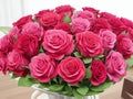 Image of a beautifully arranged bouquet of red roses placed on a white background Royalty Free Stock Photo