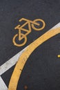 Image of Bicycle sign or icon on the road in the park. Bike path Royalty Free Stock Photo