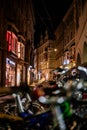 Image with bikes infront out of focus and old archicture building ancient at night