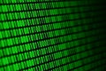An image of a binary code made up of a set of green digits on a black background Royalty Free Stock Photo