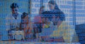Image of binary coding and data processing over business people working in office Royalty Free Stock Photo