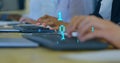 Image of binary coding data processing over diverse business people using computers Royalty Free Stock Photo