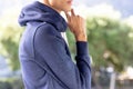 Image of biracial man in blue long sleeve hooded top with copyspace Royalty Free Stock Photo