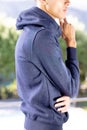 Image of biracial man in blue long sleeve hooded top with copyspace Royalty Free Stock Photo