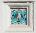 Image of a bird on ceramic tile. Ancient decoration of the ancient orthodox church Royalty Free Stock Photo