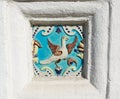 Image of a bird on ceramic tile. Ancient decoration of the ancient orthodox church Royalty Free Stock Photo