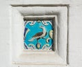 Image of a bird on ceramic tile. Ancient decoration of the ancient orthodox church Royalty Free Stock Photo