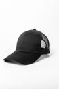 a black baseball cap with mesh detailing on the front of it